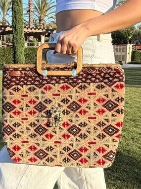 Earth Art hand crafted artisan Beige Woven Tote with Red & Black Tile Motif rug